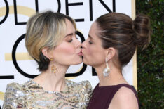 Sarah Paulson and Amanda Peet kiss at the 74th Annual Golden Globe Awards