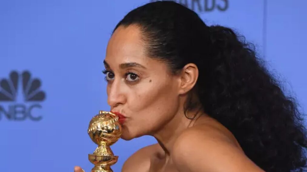 Tracee Ellis Ross, winner of Best Performance in a Television Series - Musical or Comedy for 'Black-ish,' kisses her award at the 74th Annual Golden Globe Awards
