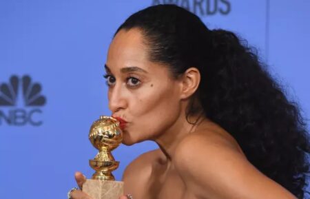 Tracee Ellis Ross, winner of Best Performance in a Television Series - Musical or Comedy for 'Black-ish,' kisses her award at the 74th Annual Golden Globe Awards