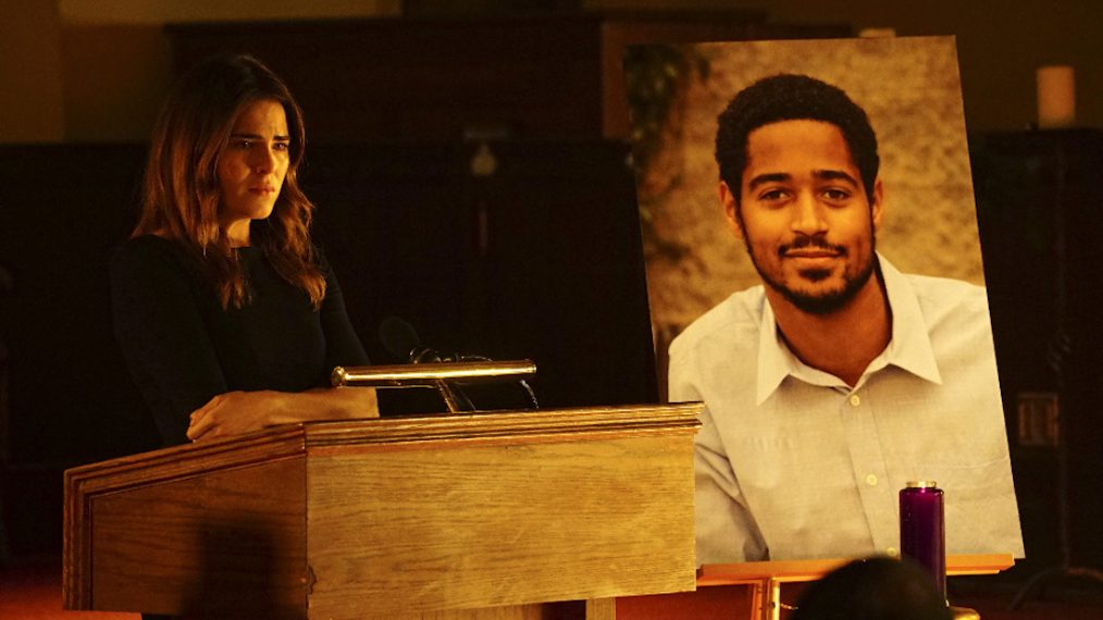 Karla Souza and a poster of Alfred Enoch - How to Get Away With Murder