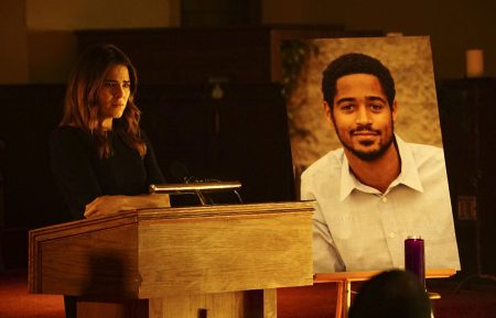 Karla Souza and a poster of Alfred Enoch - How to Get Away With Murder