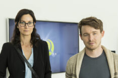 Carrie-Anne Moss and Marshall Allman in Humans