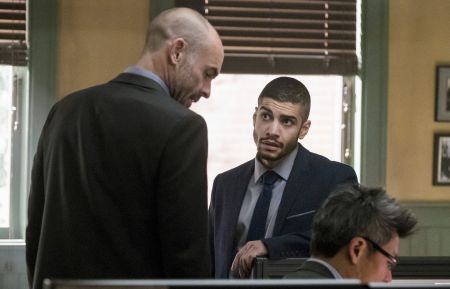 Paul Blackthorne as Quentin Lance and Rick Gonzalez as Rene Ramirez/Wild Dog in the 'Spectre of the Gun' episode of 'Arrow'