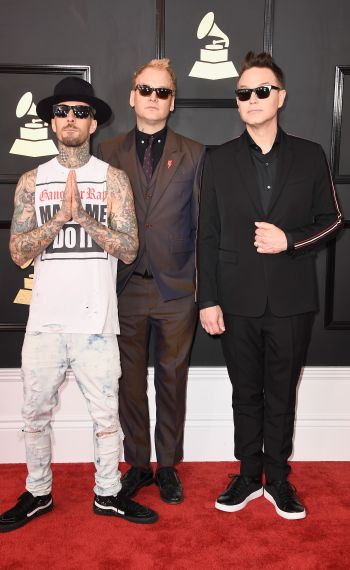 Travis Barker, Mark Hoppus, and Matt Skiba of blink-182 attend The 59th Grammy Awards