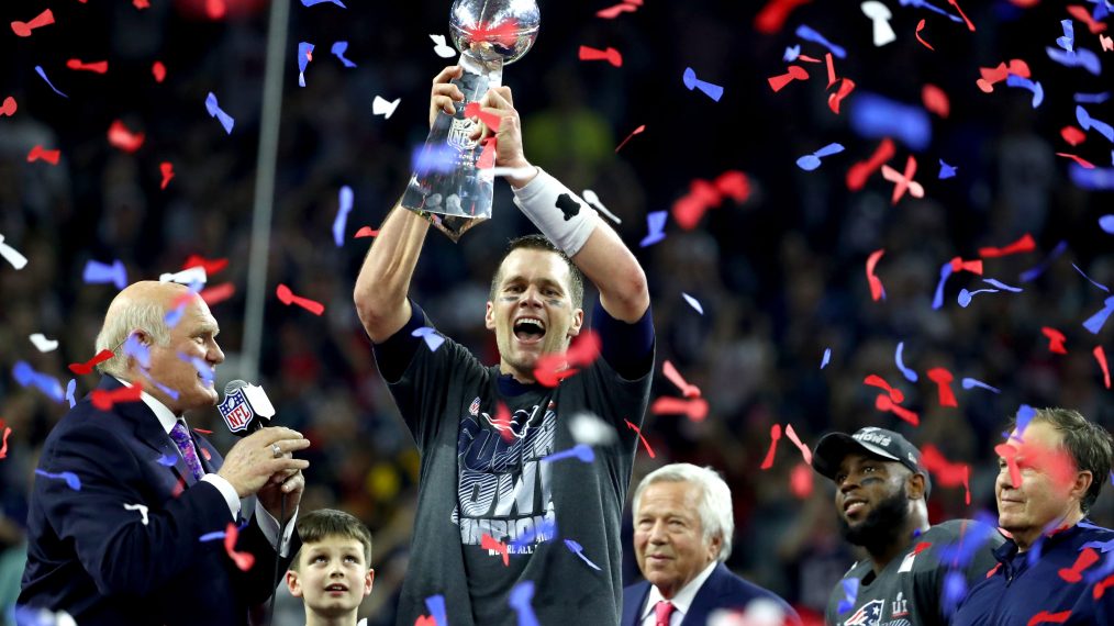 New England Patriots quarterback Tom Brady hoists the Vince Lombardi Trophy after his team's victory in Super Bowl LI