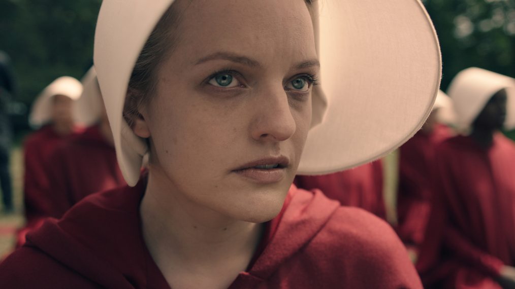 The Handmaid's Tale - Elisabeth Moss; THE HANDMAID'S TALE -- The drama series, based on the award-winning, best-selling novel by Margaret Atwood, is the story of life in the dystopia of Gilead, a totalitarian society in what was formerly part of the United States. Facing environmental disasters and a plunging birthrate, Gilead is ruled by a fundamentalist regime that treats women as property of the state. As one of the few remaining fertile women, Offred (Elisabeth Moss) is a Handmaid in the Commanders household, one of the caste of women forced into sexual servitude as a last desperate attempt to repopulate a devastated world. In this terrifying society where one wrong word could end her life, Offred navigates between Commanders, their cruel Wives, domestic Marthas, and her fellow Handmaids  where anyone could be a spy for Gilead  all with one goal: to survive and find the daughter that was taken from her. Offred (Elisabeth Moss), shown.