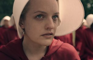 The Handmaid's Tale - Elisabeth Moss; THE HANDMAID'S TALE -- The drama series, based on the award-winning, best-selling novel by Margaret Atwood, is the story of life in the dystopia of Gilead, a totalitarian society in what was formerly part of the United States. Facing environmental disasters and a plunging birthrate, Gilead is ruled by a fundamentalist regime that treats women as property of the state. As one of the few remaining fertile women, Offred (Elisabeth Moss) is a Handmaid in the Commanders household, one of the caste of women forced into sexual servitude as a last desperate attempt to repopulate a devastated world. In this terrifying society where one wrong word could end her life, Offred navigates between Commanders, their cruel Wives, domestic Marthas, and her fellow Handmaids where anyone could be a spy for Gilead all with one goal: to survive and find the daughter that was taken from her. Offred (Elisabeth Moss), shown.