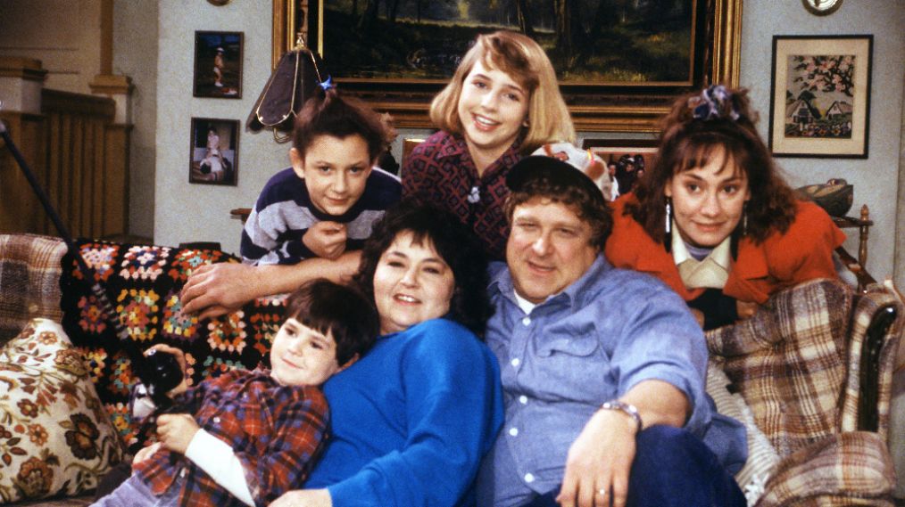 Roseanne - Michael Fishman as DJ Conner, Sara Gilbert as Darlene Conner, Roseanne Barr as Roseanne Conner, Alicia Goranson as Becky Conner, John Goodman as Dan Conner, and Laurie Metcalf as Jackie Harris