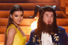 Hailee Steinfeld and host Adam Devine perform onstage during the 2017 MTV Movie And TV Awards