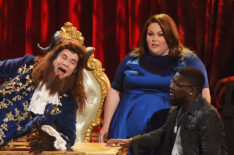 Host Adam DeVine performs onstage with actors Chrissy Metz and Lil Rel Howery during the 2017 MTV Movie And TV Awards