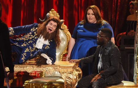 Host Adam DeVine performs onstage with actors Chrissy Metz and Lil Rel Howery during the 2017 MTV Movie And TV Awards