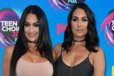 Nikki Bella and Brie Bella attend the Teen Choice Awards 2017