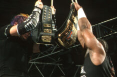 Jeff Hardy and Devon Dudley fight high above in a TLC match at the 2000 SummerSlam