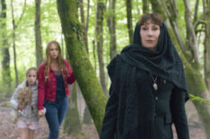 Dixie Egerickx, Tallulah Evans, and Anjelica Huston star in The Watcher in the Woods