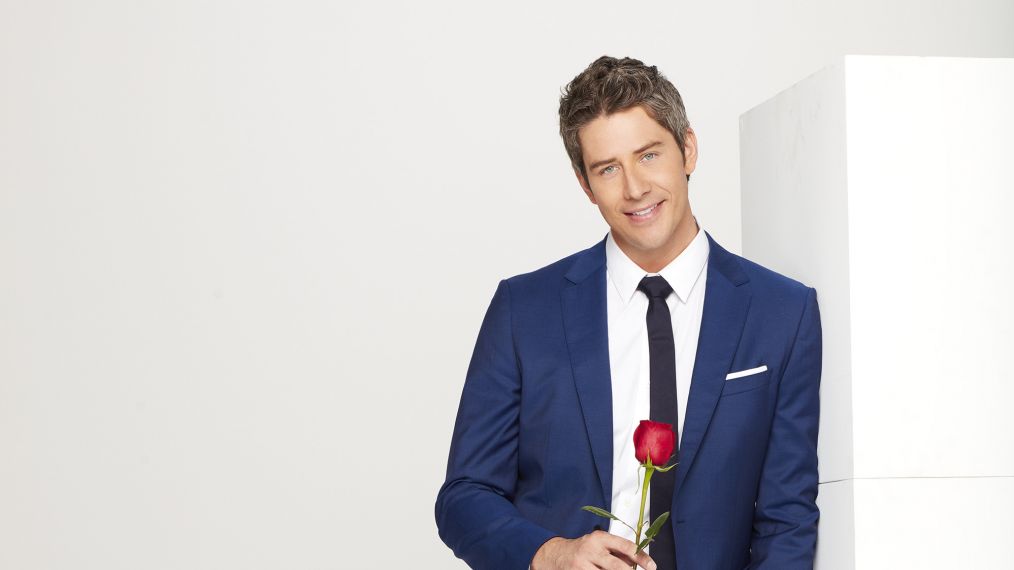 Arie Luyendyk Jr. with a rose