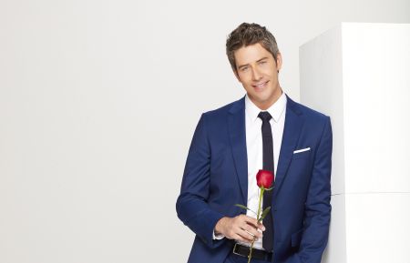 Arie Luyendyk Jr. with a rose
