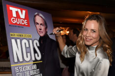 Maria Bello signing the NCIS TV Guide Magazine cover