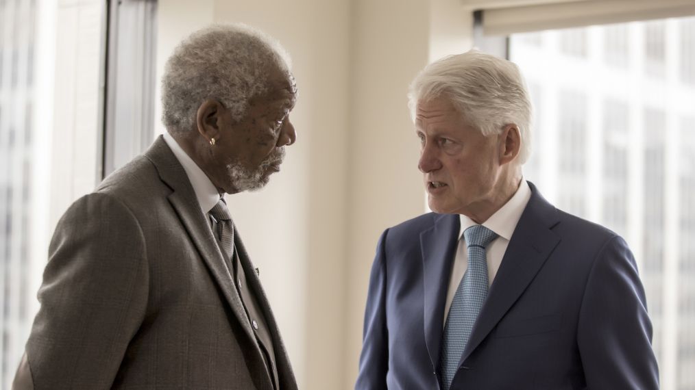 Host Morgan Freeman converses with President Bill Clinton as seen on National Geographic's The Story of Us with Morgan Freeman