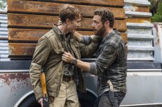 Jordan Woods-Robinson as Eric Raleigh and Ross Marquand as Aaron in The Walking Dead