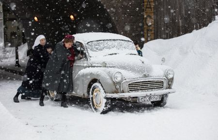Jenny Agutter as Sister Julienne and Linda Bassett as Nurse Phyllis pushing a car in the snow in Call the Midwife Christmas 2017