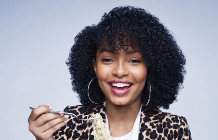 Yara Shahidi as Zoey Johnson eating ramen noodles in Grown-ish