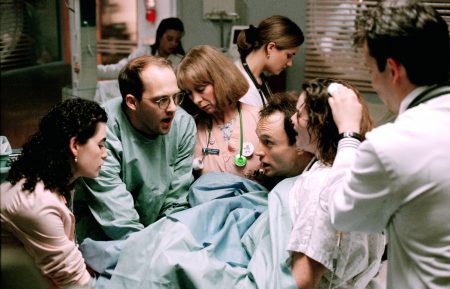 ER- Julianna Margulies as Nurse Carol Hathaway, Anthony Edwards as Dr. Mark Greene, Ellen Crawford as Nurse Lydia Wright, and Sherry Stringfield as Dr. Susan Lewis with the assistance of father (Bradley Whitford) help deliver mother's (Colleen Flynn) baby, and Noah Wyle as medical student Dr. John Carter