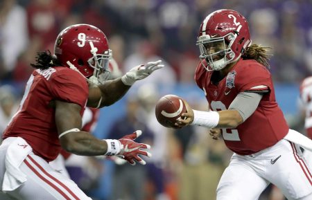 Alabama quarterback Jalen Hurts #2 leads the Crimson Tide against the Georgia Bulldogs in the 2018 National Championship Game