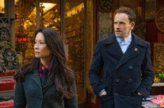 Lucy Liu as Joan Watson and Jonny Lee Miller as Sherlock Holmes in Elementary