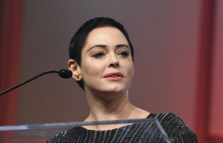 Rose McGowan speaks on stage at The Women's Convention in October 2017