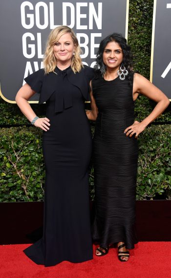 Amy Poehler and Saru Jayaraman attend The 75th Annual Golden Globe Awards