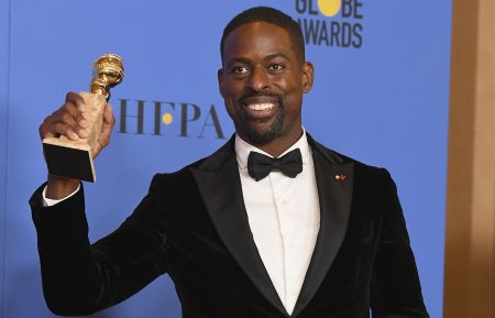 Sterling K. Brown holds his award for Best Performance by an Actor In A Television Series Drama in 'This Is Us' in the press room during The 75th Annual Golden Globe Awards