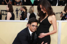 John Stamos and Caitlin McHugh attend the 24th Annual Screen Actors Guild Awards