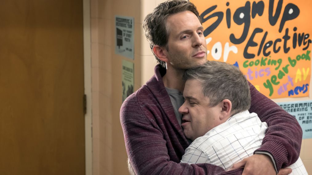 Glenn Howerton and Patton Oswalt hug in A.P. Bio