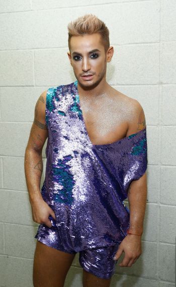 Frankie Grande prepares backstage during the Popoganda By Richie Rich during New York Fashion Week