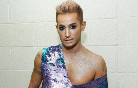 Frankie Grande prepares backstage during the Popoganda By Richie Rich during New York Fashion Week