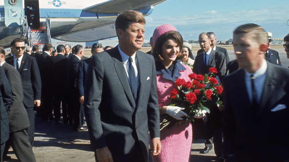 Pres. John F. Kennedy and wife Jackie arriving at