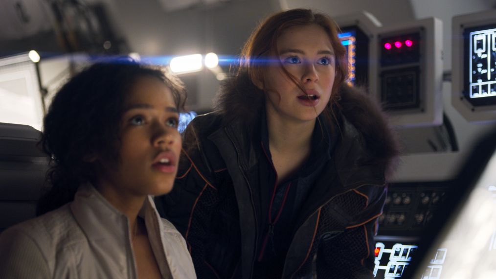 Taylor Russell as Judy Robinson and Mina Sundwall as her sister, Penny, in Lost In Space