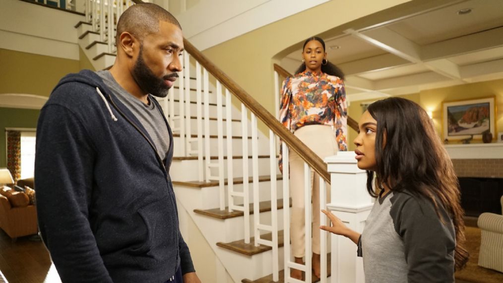 Cress Williams as Jefferson Pierce, Nafessa Williams as Anissa Pierce, and China Anne McClain as Jennifer Pierce in Black Lightning