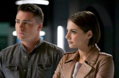 Colton Haynes as Roy and Willa Holland as Thea in Arrow.