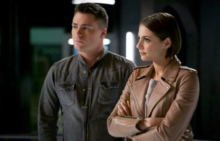 Colton Haynes as Roy and Willa Holland as Thea in Arrow.