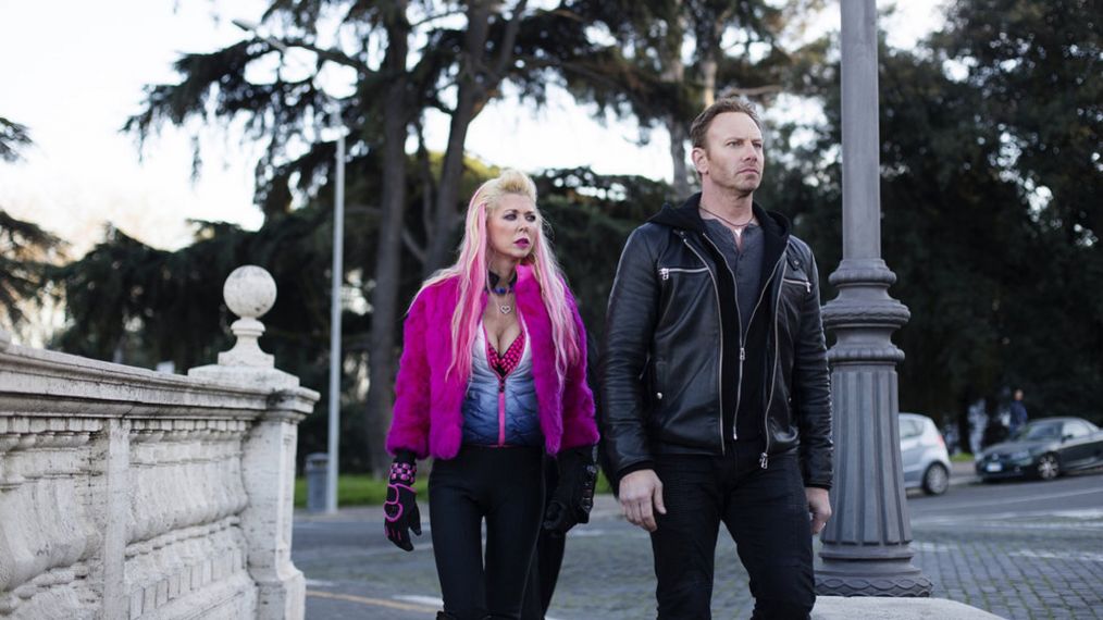 Sharknado 5: Global Swarming - Tara Reid as April Shepard and Ian Ziering as Fin Shepard