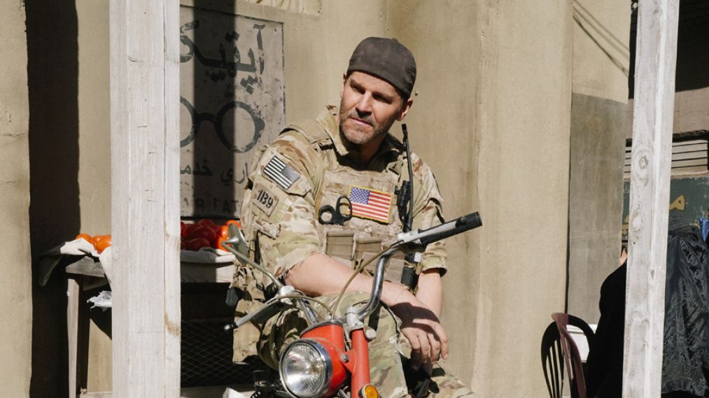 David Boreanaz on SEAL Team sitting on a motorcycle