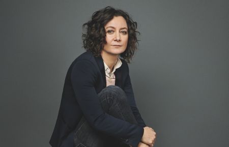 Sara Gilbert on a pedestal