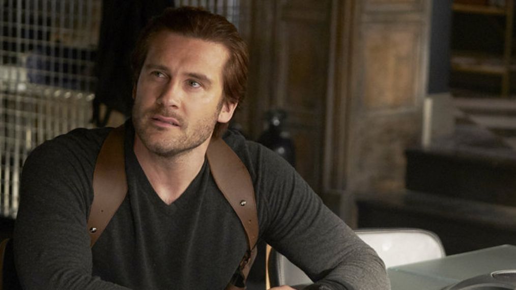Clive Standen as Bryan Mills, Jessica Camacho as Santana in Taken - Season 2
