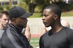 Taye Diggs as Billy Baker and Daniel Ezra as Spencer James in All American