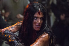Marie Avgeropoulos as Octavia in The 100
