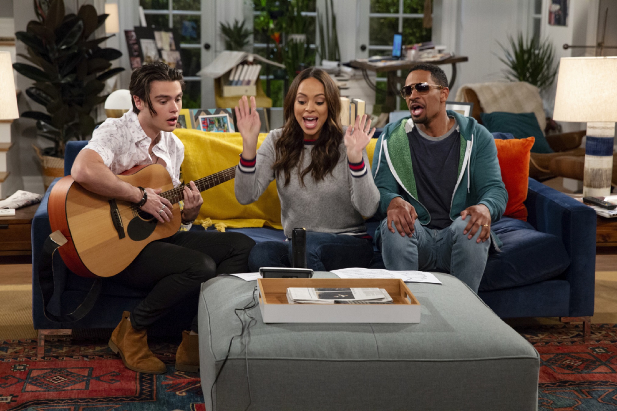 HAPPY TOGETHER stars Damon Wayans Jr. (right) and Amber Stevens West (center) in a comedy about a 30-something happily married couple who begin to reconnect with their younger, cooler selves when Cooper (Felix Mallard, left), an exuberant young pop star drawn to their super ordinary suburban life, unexpectedly moves in with them. HAPPY TOGETHER will premiere this fall on Mondays (8:30-9:00 PM, ET/PT) on the CBS Television Network. Photo: Cliff Lipson/CBS é2018 CBS Broadcasting, Inc. All Rights Reserved