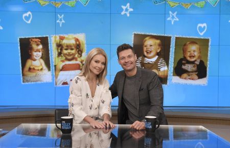 Kelly Ripa and Ryan Seacrest are pictured during the production of 'Live with Kelly and Ryan' in New York