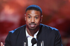 Michael B. Jordan accepts the Best Villain award for 'Black Panther' onstage during the 2018 MTV Movie And TV Awards