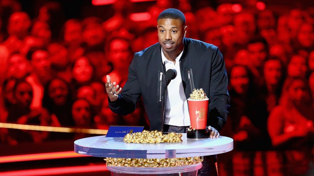 SANTA MONICA, CA - JUNE 16: Actor Michael B. Jordan accepts the Best Villain award for 'Black Panther' onstage during the 2018 MTV Movie And TV Awards at Barker Hangar on June 16, 2018 in Santa Monica, California. (Photo by Rich Fury/Getty Images)